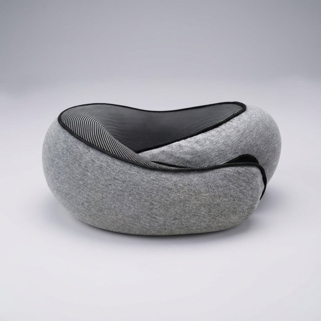 Memory Foam Travel Neck Pillow with 360° support and chin strap, designed for neck pain relief, featuring a compact design ideal for travel. 0